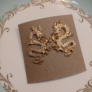172- Gold tone oversized dragon statement earrings